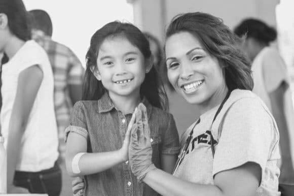 A school nurse works with a patient.