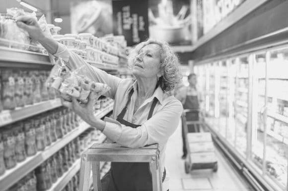 A retail store manager works in a grocery store.