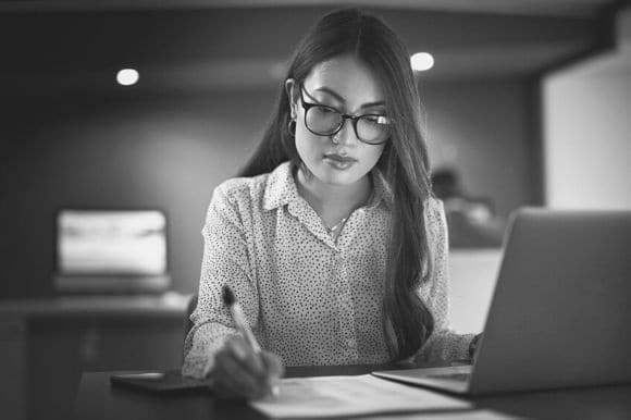 Tax accountant working on office computer